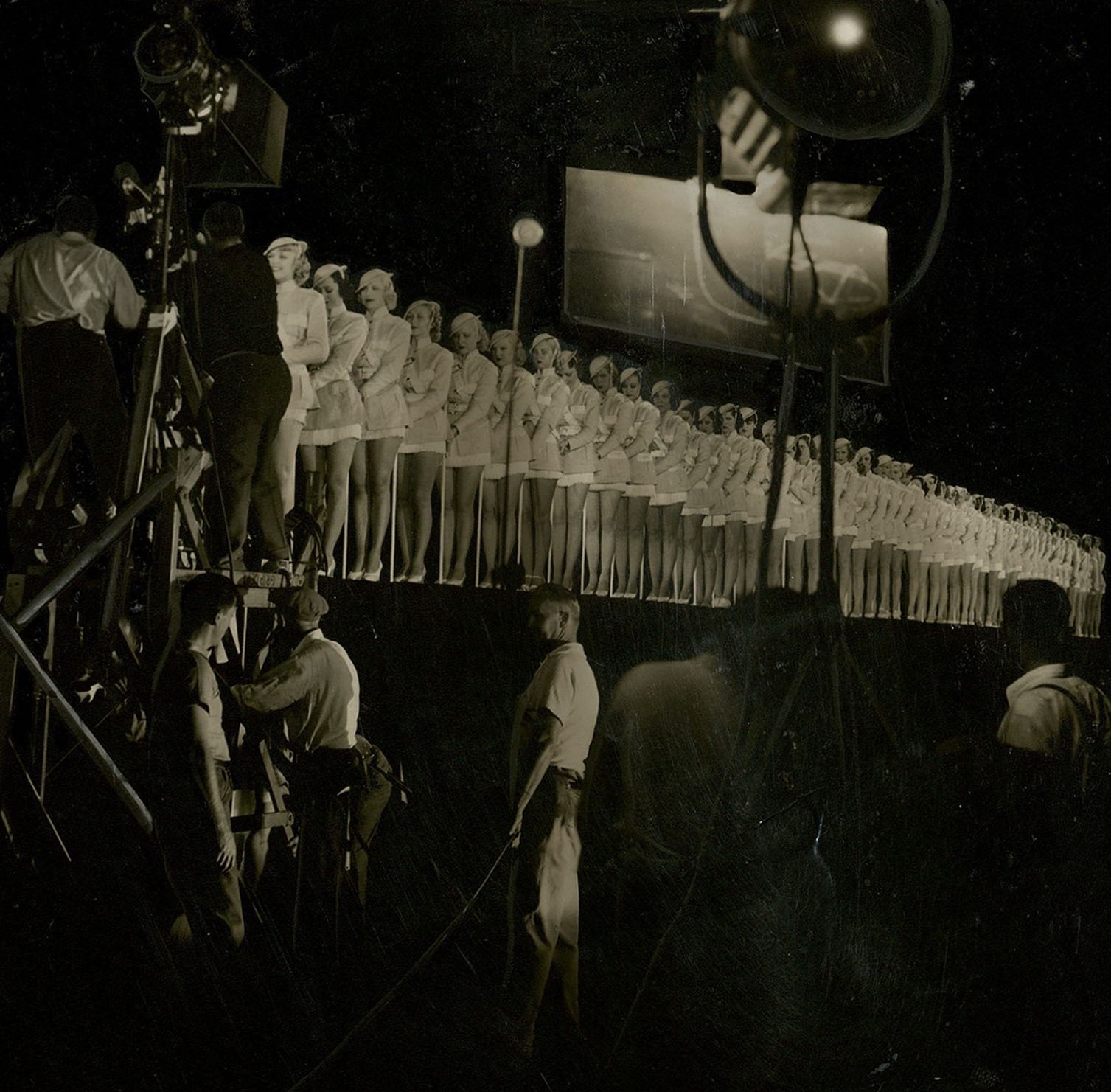 Stage view of 104-chorus line for the movie Gold Diggers of 1937